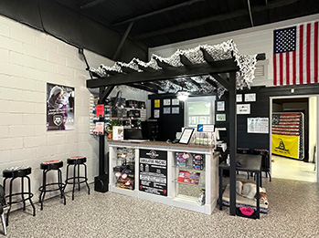 Shooting Range Interior with Check In Booth and American Flag